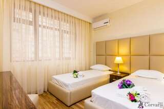 Отель Hotel Corvaris Бухарест Двухместный номер с 2 отдельными кроватями-2