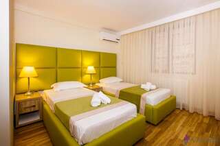Отель Hotel Corvaris Бухарест Двухместный номер с 2 отдельными кроватями-3